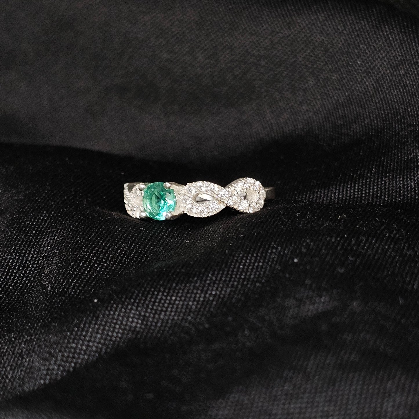 Emerald Infinity Ring – Size 6.5, 2.5g, Silver with CZ Accents