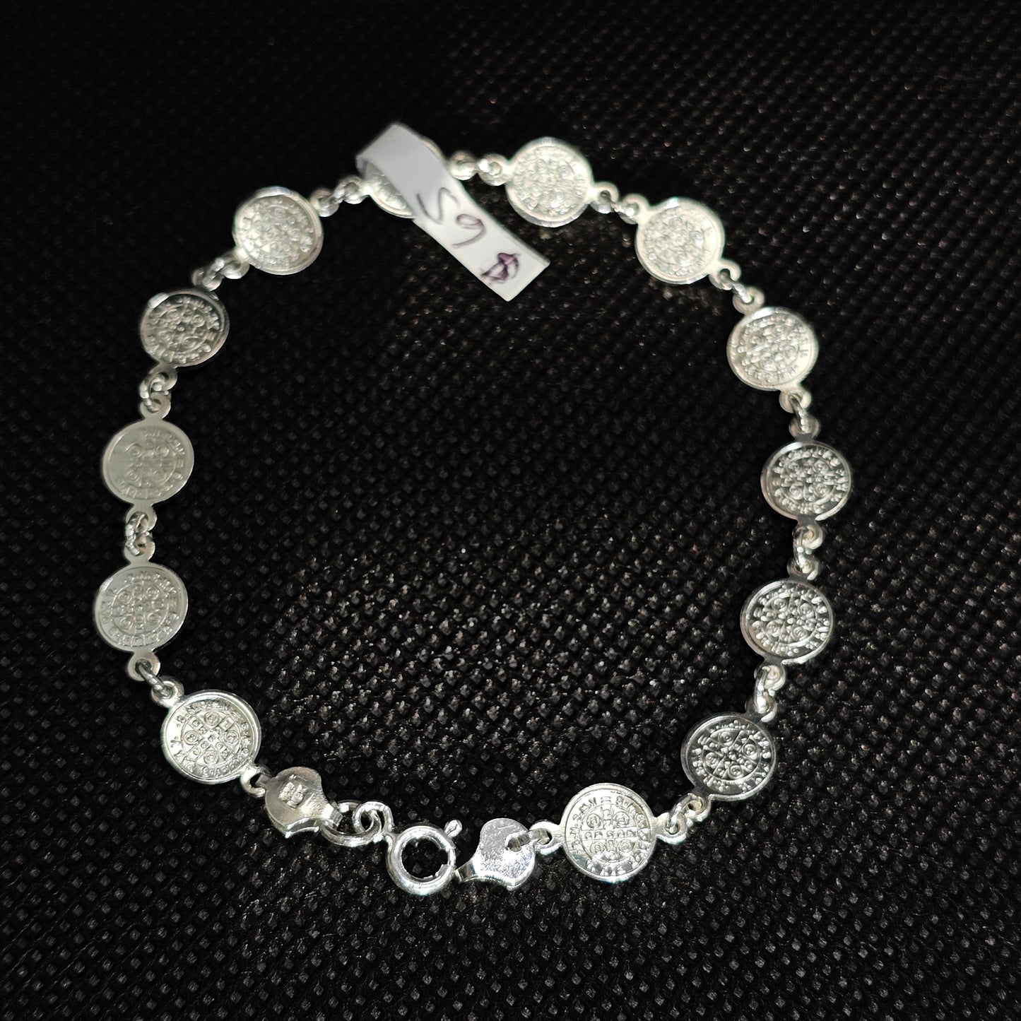 Elegant Silver Coin Bracelet with Textured Medallion Design