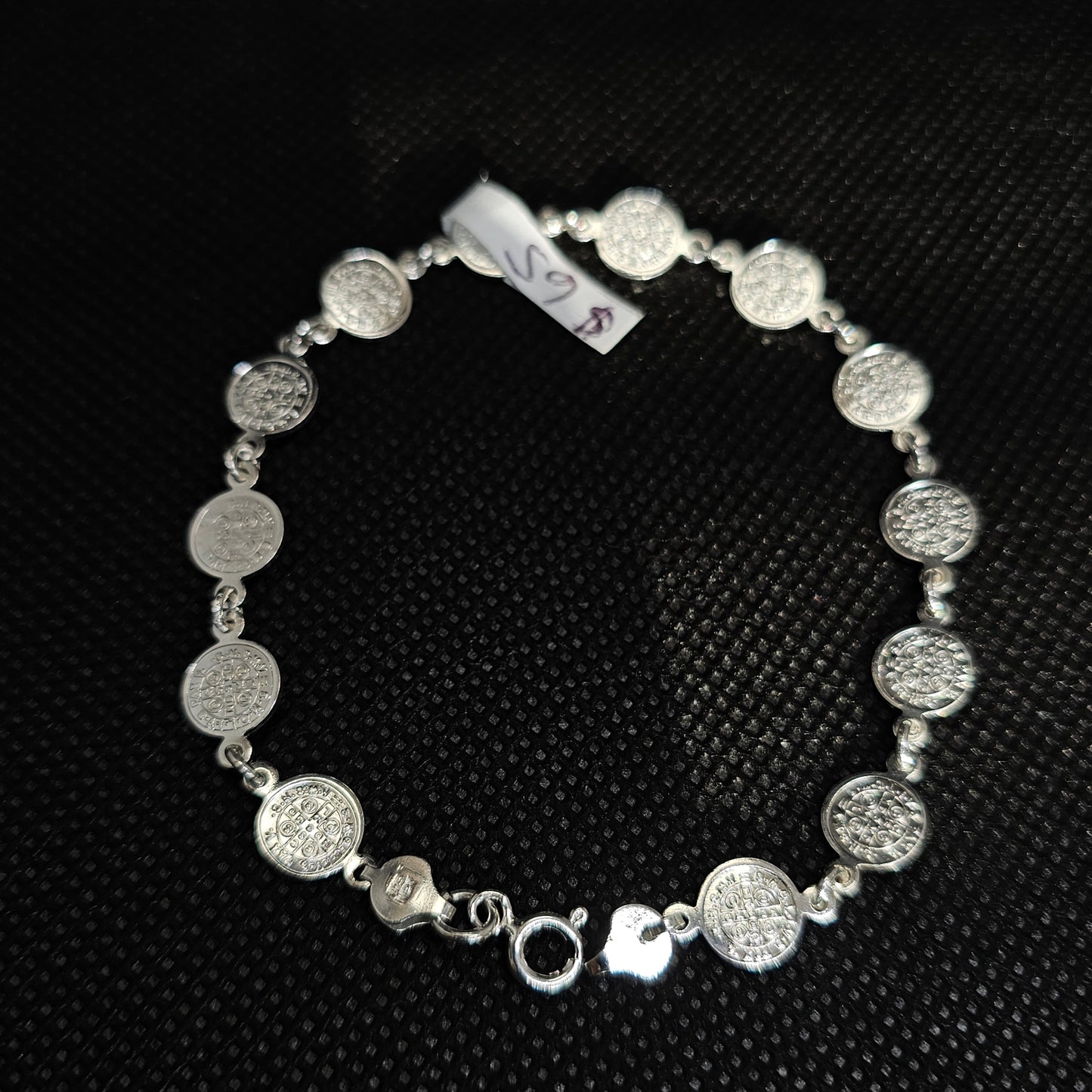 Elegant Silver Coin Bracelet with Textured Medallion Design
