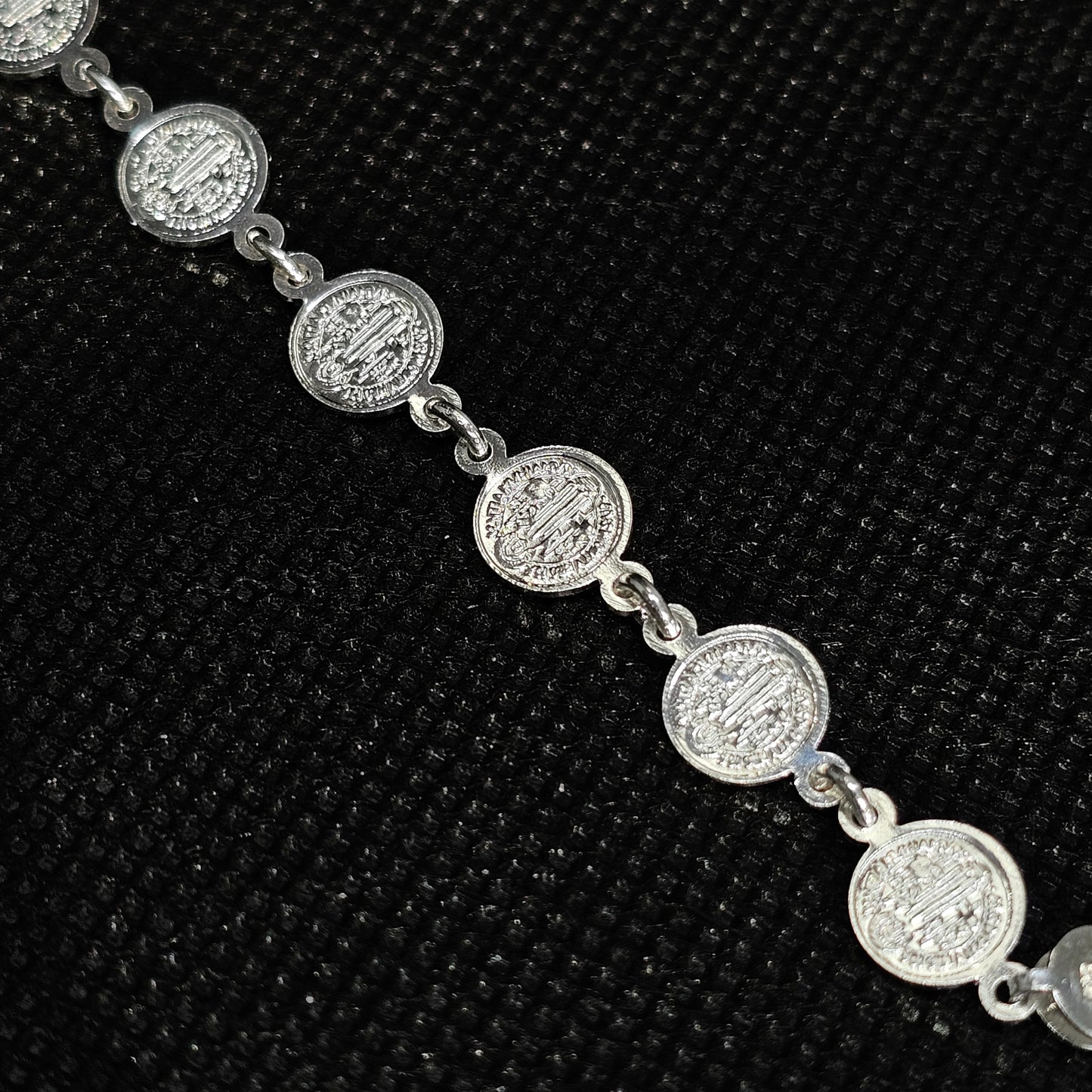Elegant Silver Coin Bracelet with Textured Medallion Design