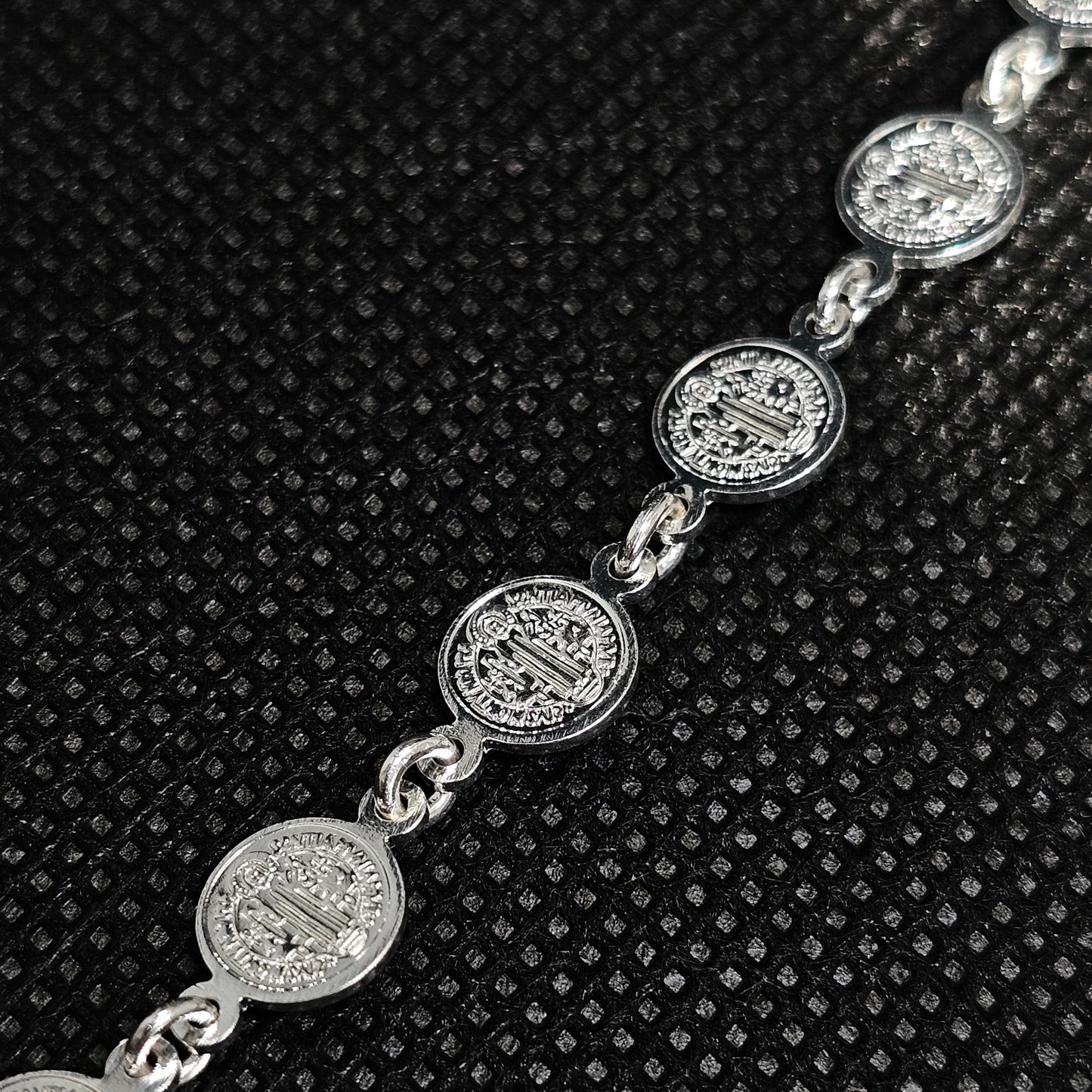 Elegant Silver Coin Bracelet with Textured Medallion Design