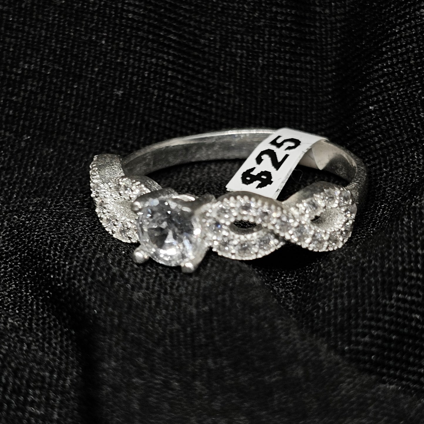 Silver Infinity Band Ring with Round Center Stone – Size 8