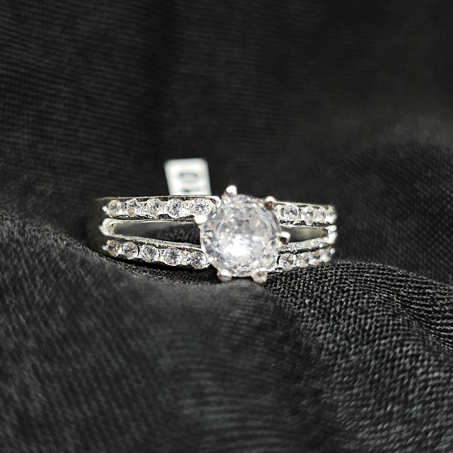 Silver Round Cut Solitaire Ring with Double Row Accent Stones