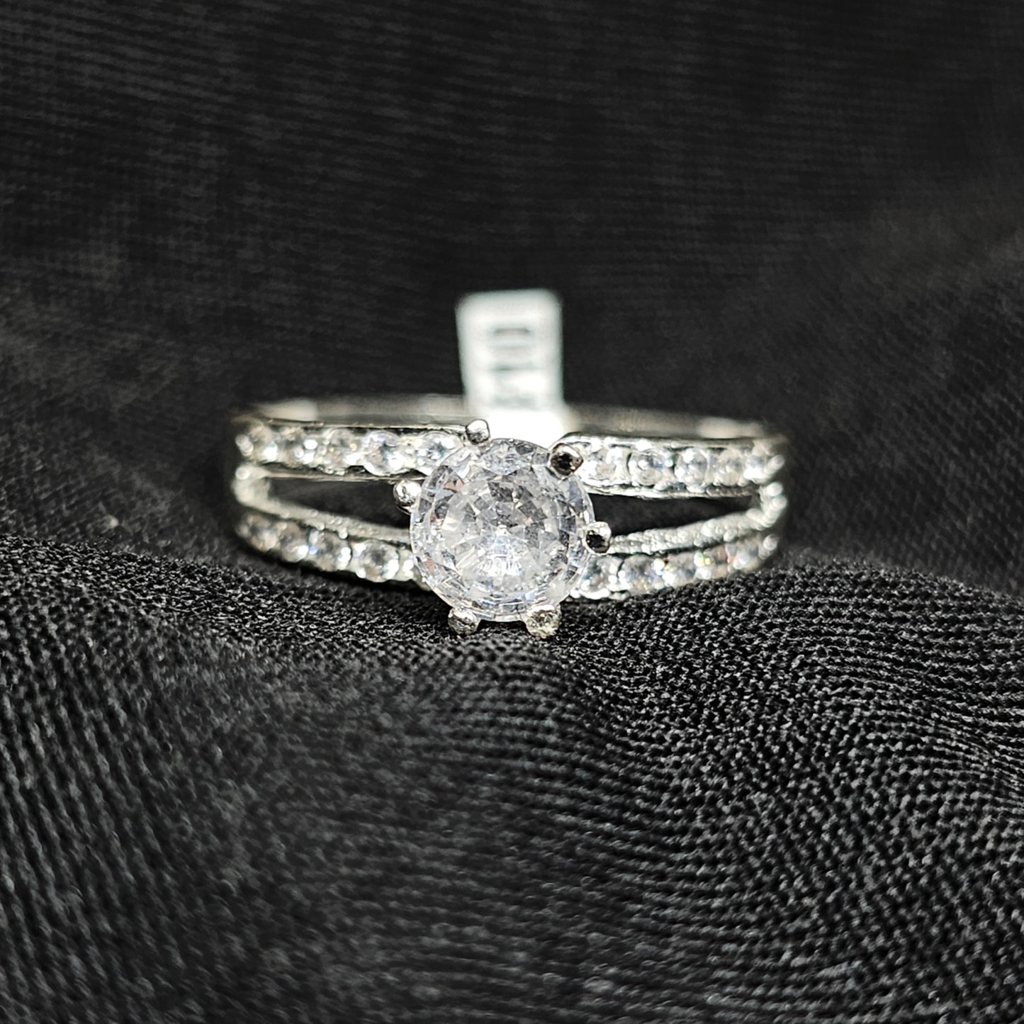 Silver Round Cut Solitaire Ring with Double Row Accent Stones