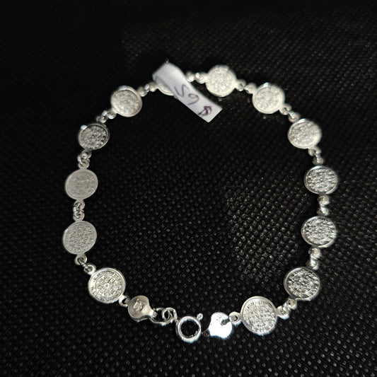 Elegant Silver Coin Bracelet with Textured Medallion Design