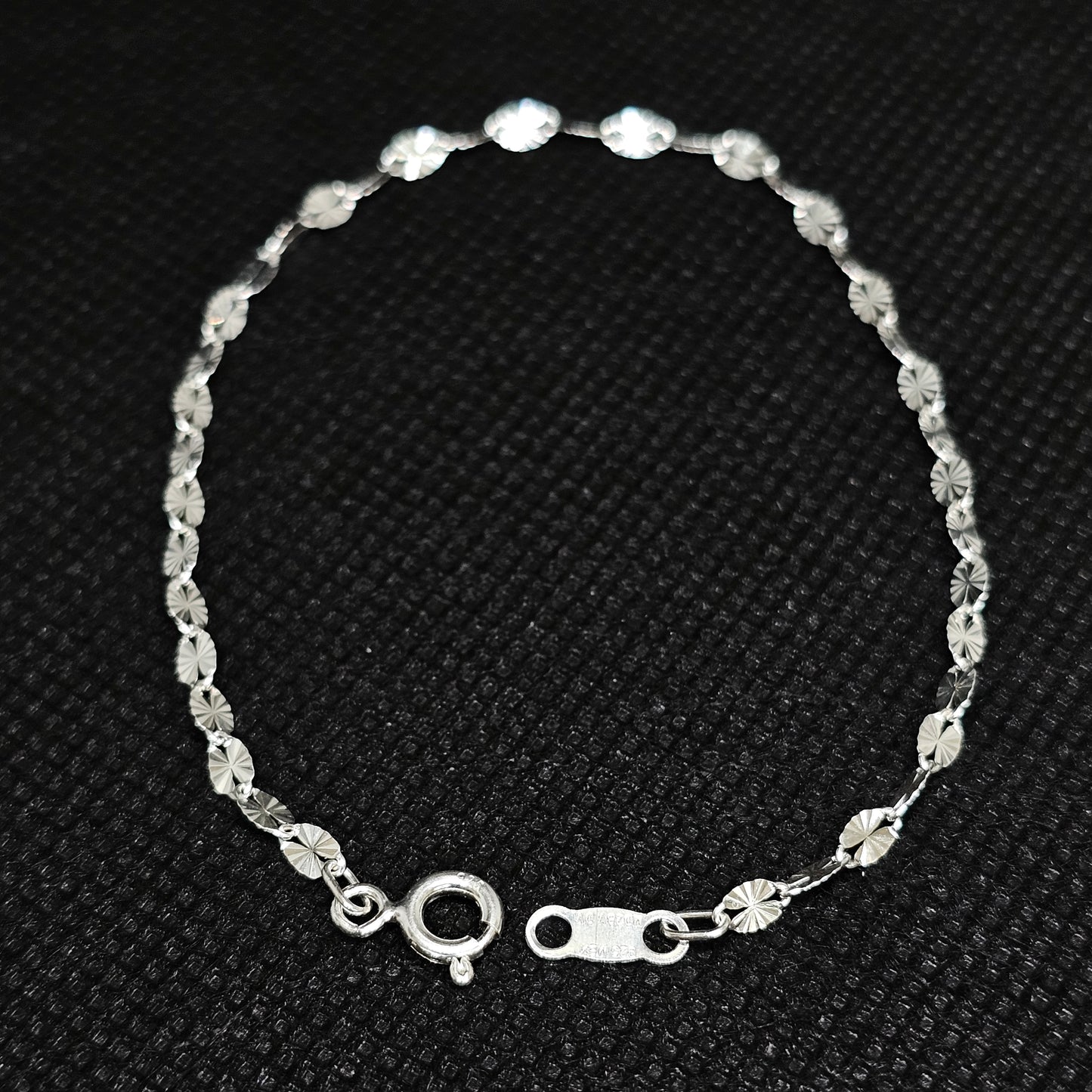 Silver Starburst Disc Chain Bracelet with High Polish Finish