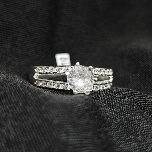 Silver Round Cut Solitaire Ring with Double Row Accent Stones